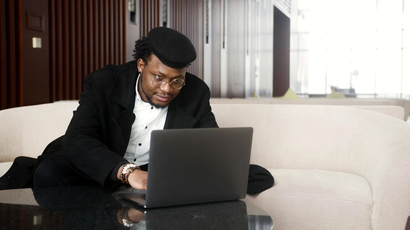 African creative professional working on a digital project